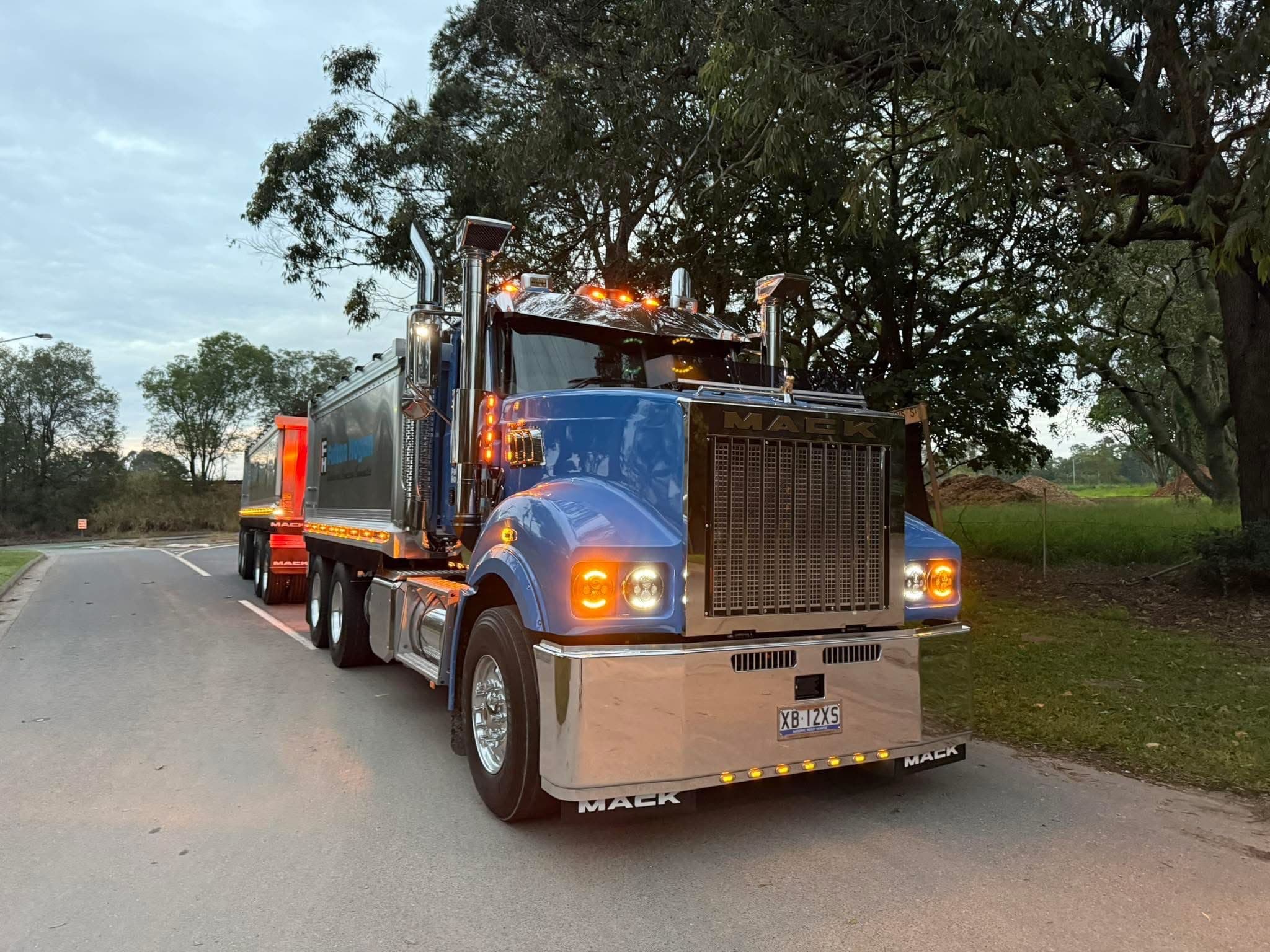 Mack Trident at dusk — gear delivered