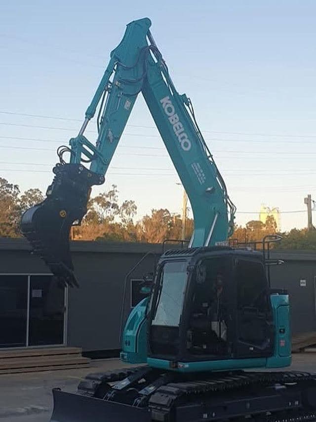 Kobelco excavator with hammer attachment