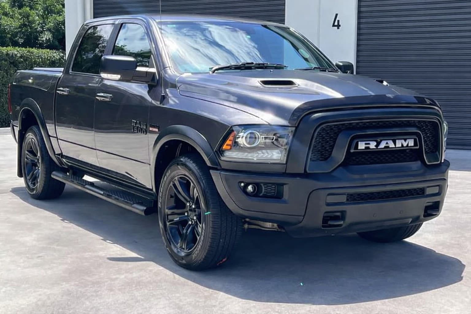 Charcoal Ram 1500 dual cab pickup in a workshop